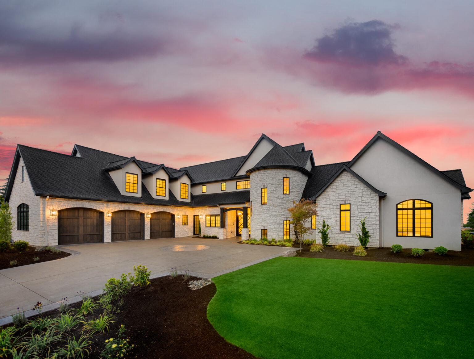 Stone-clad residence illuminated at dusk